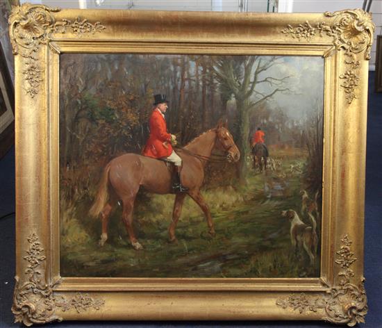 § George Denholm Armour (1864-1949) Huntsman and hounds at the edge of a wood 25 x 30in.